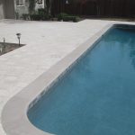 Artistic Pavers with silver pebble pool finish