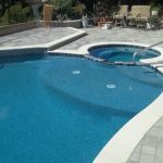 Pool spa white coping pavers handrail