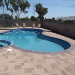 pool and spa with crystal blue radiance brick coping brown flash and orco vill pavers