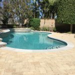 backyard with pool pavers coping radiant fusion pearl