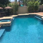 Pool Spa with tiled Dam wall and veneer on raised bond beam