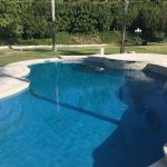 Pool with pavers and different raised bond beam heights