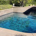 pool pebble raised bond beam