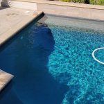 pool pebble raised bond beam